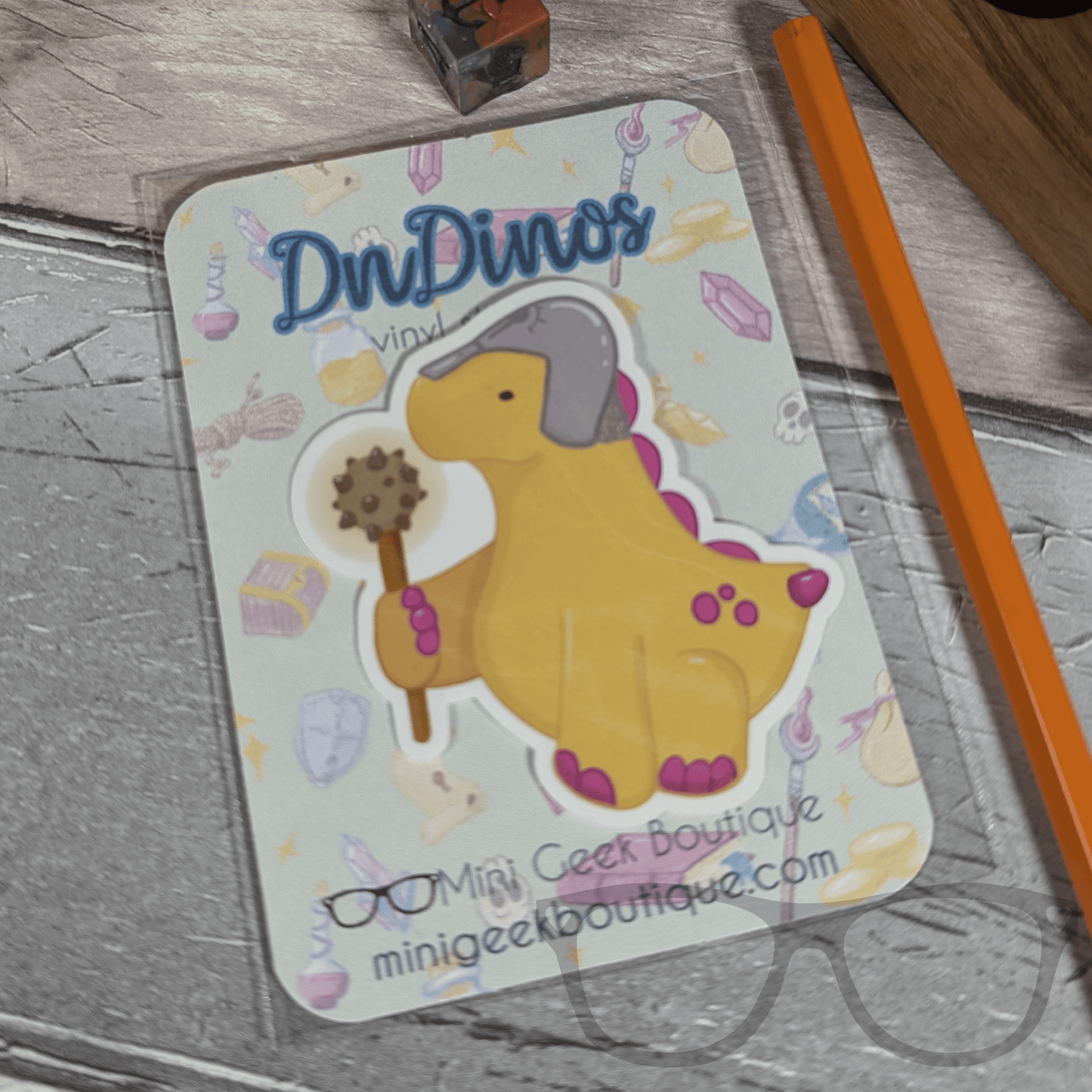 Derek the Cleric Stegosaurus Vinyl Sticker - TTRPG Dinosaur Healer Design - Mini Geek Boutique