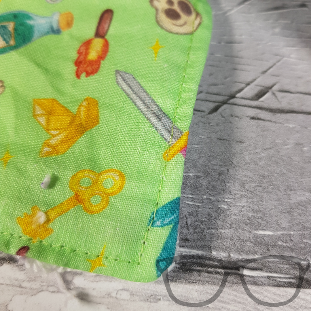 set of 5 washable face wipes in light green with fantasy iconography