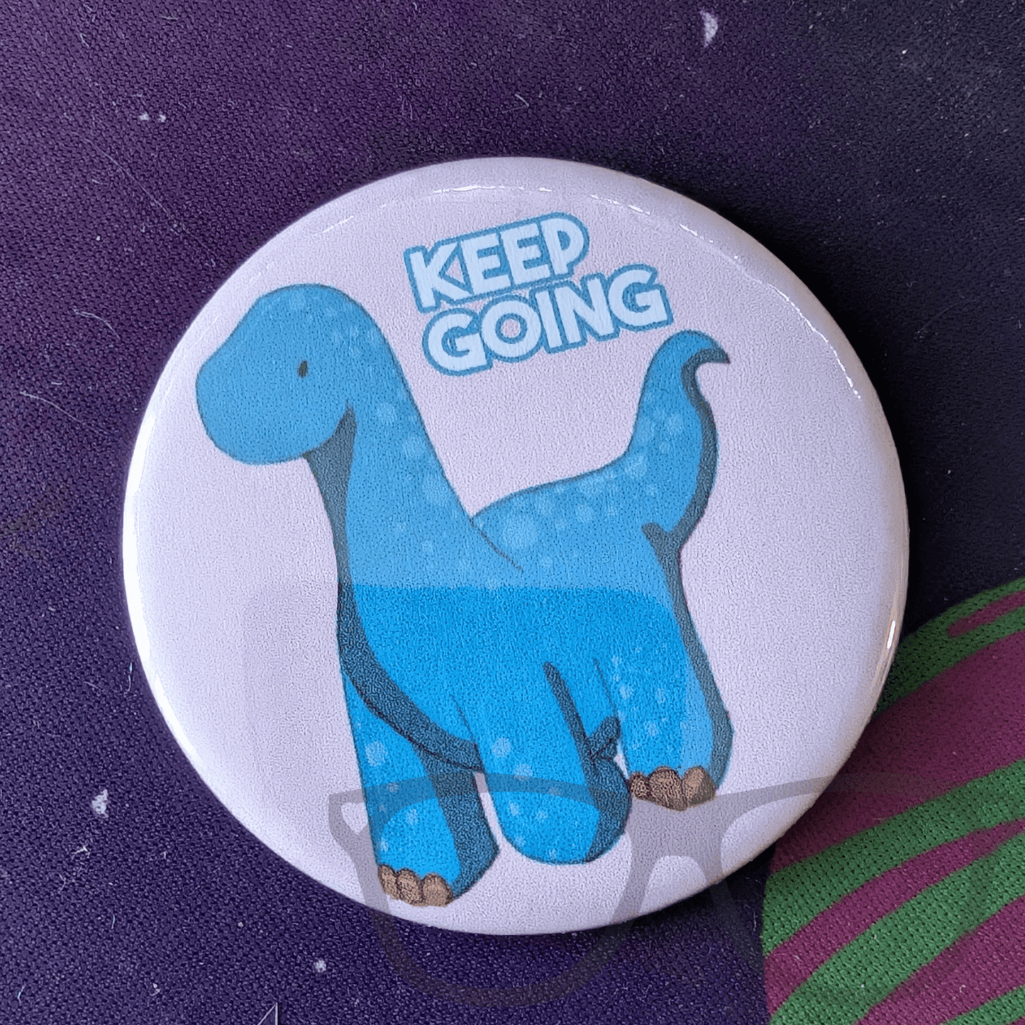 Keep Going Dinosaur badge, keyring or magnet - Mini Geek Boutique