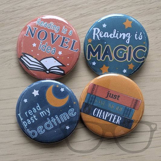 Set of 4 38mm badges ideal for lovers of books and reading. Text reads "Reading is a novel idea", "Reading is magic", "I read past my bedtime",  "Just one more chapter"