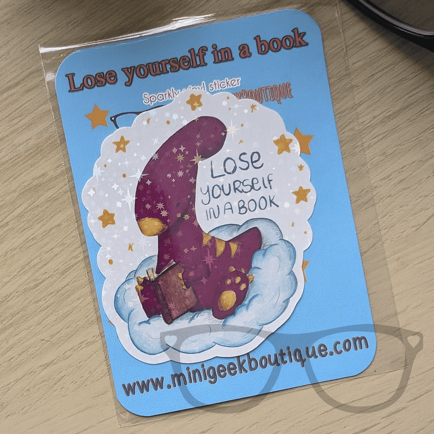 Sparkly Vinyl Sticker - Irene the Parasaurolophus Reading on a Cloud - Mini Geek Boutique