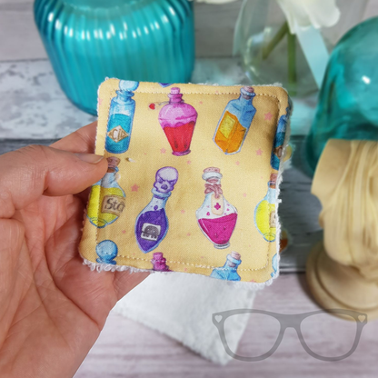 reusable face wipe with potion bottle fabric design