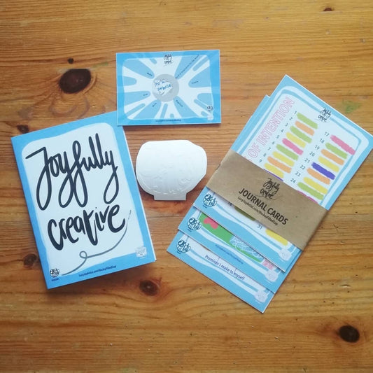 Flat lay of the joyful cup cards by Lucy Joy