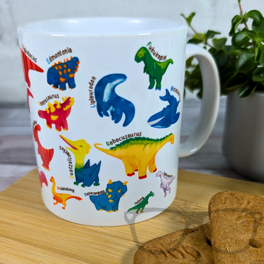 A to Z of Dinosaurs ceramic mug – colourful dinosaur illustrations wrap around an 11oz white mug