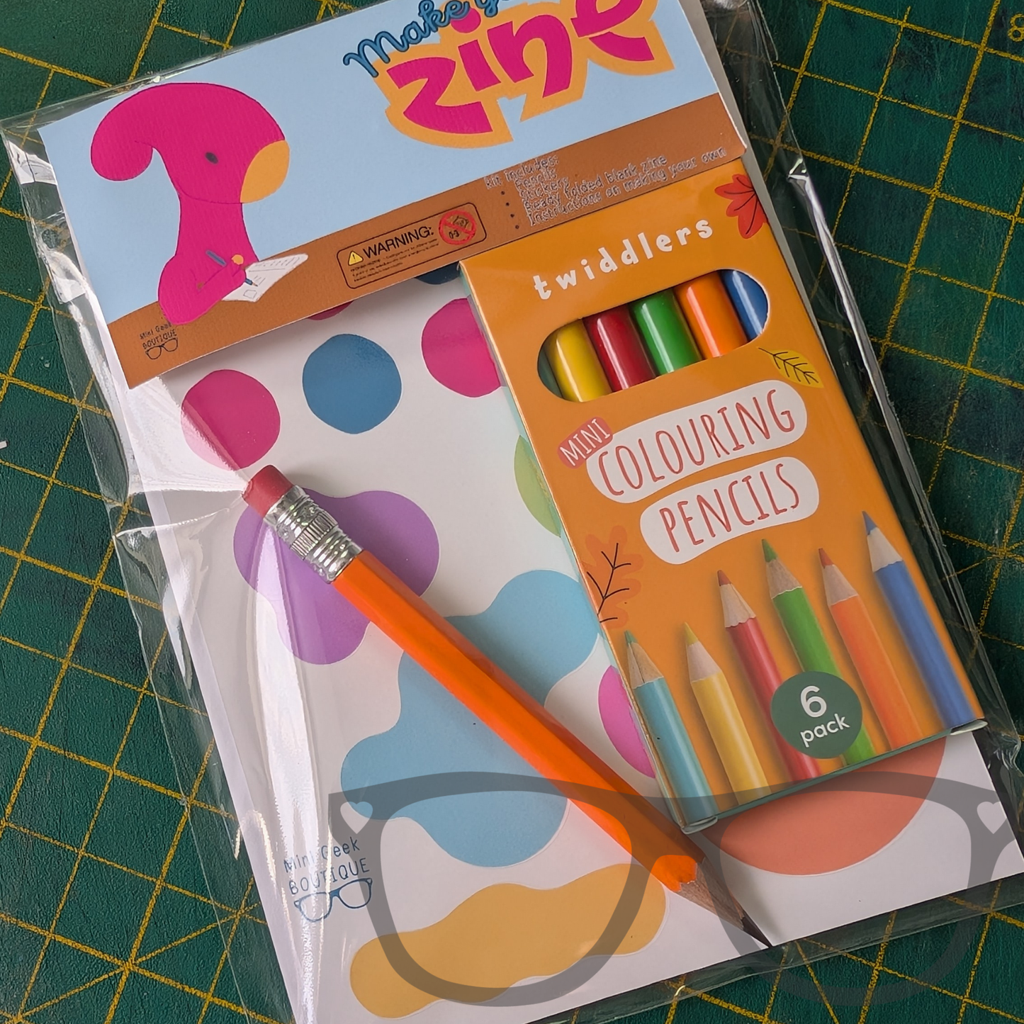 Make your own DIY Zine kit with folded paper blank zine, stickers, coloured pencils and drawing pencil, ideal as an activity to keep your kids busy
