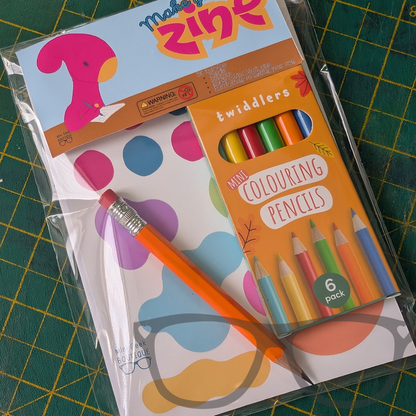 Make your own DIY Zine kit with folded paper blank zine, stickers, coloured pencils and drawing pencil, ideal as an activity to keep your kids busy

