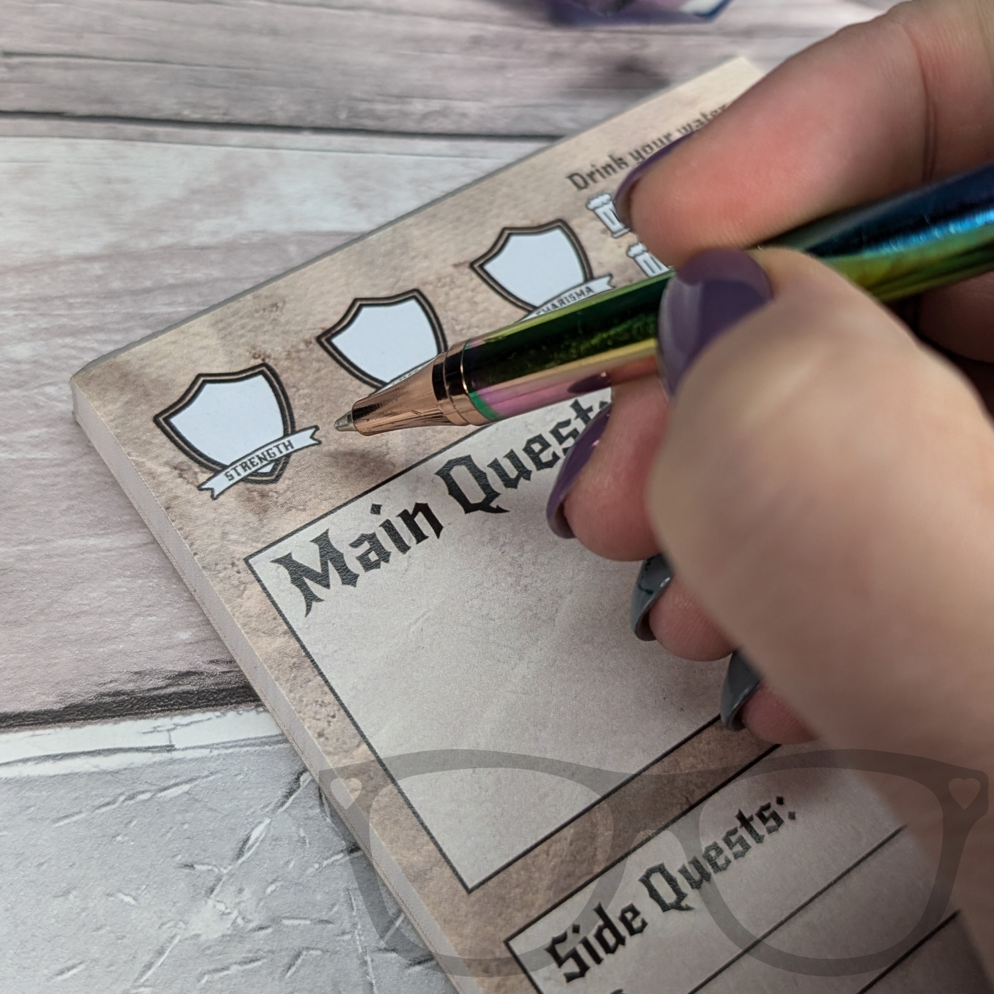 Details of DL-sized to-do list showing space for daily stats such as Strength, Wisdom, and Charisma.