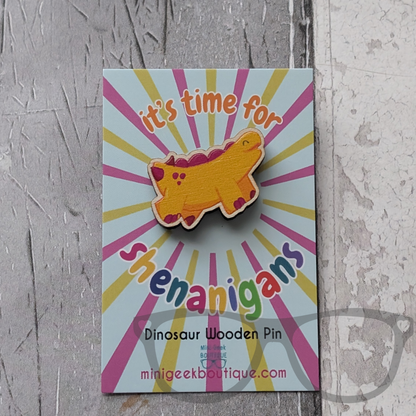 Derek the stegosaurus wooden pin on It's time for shenanigans backing card