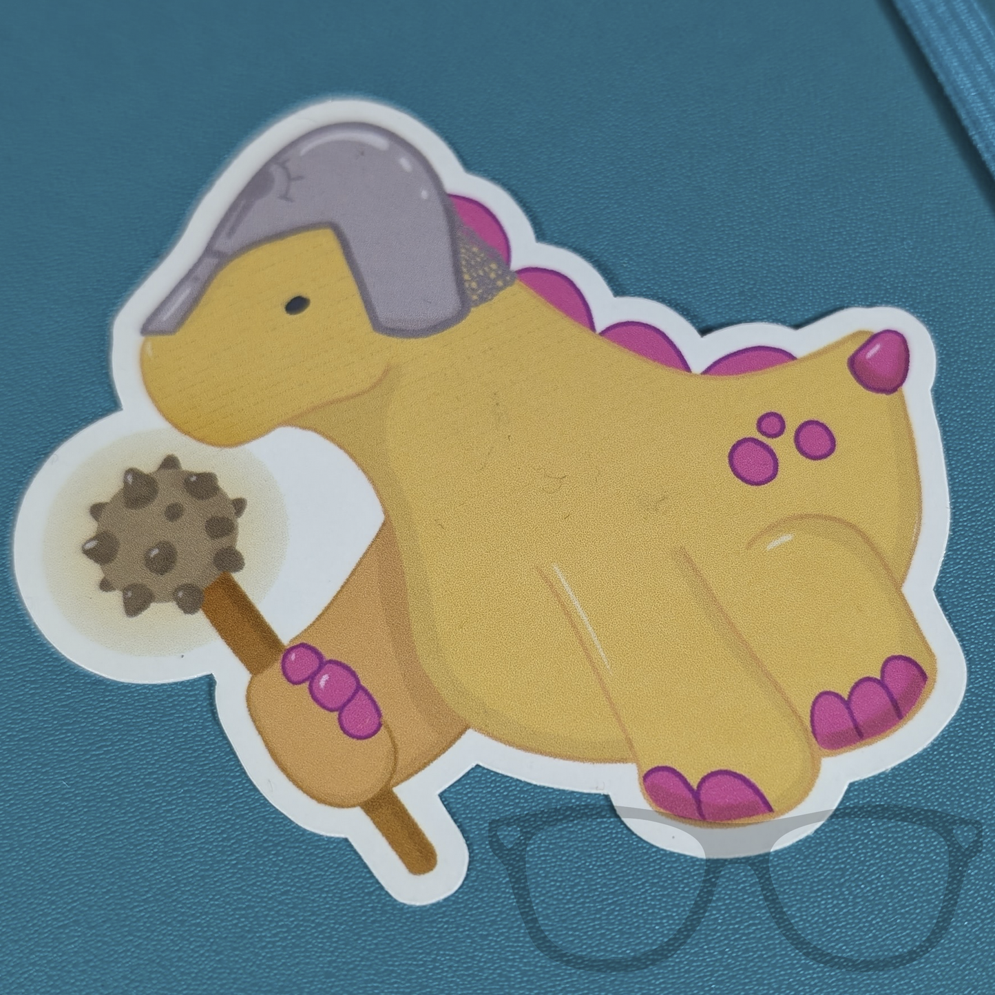 Derek the Cleric Stegosaurus vinyl sticker close up