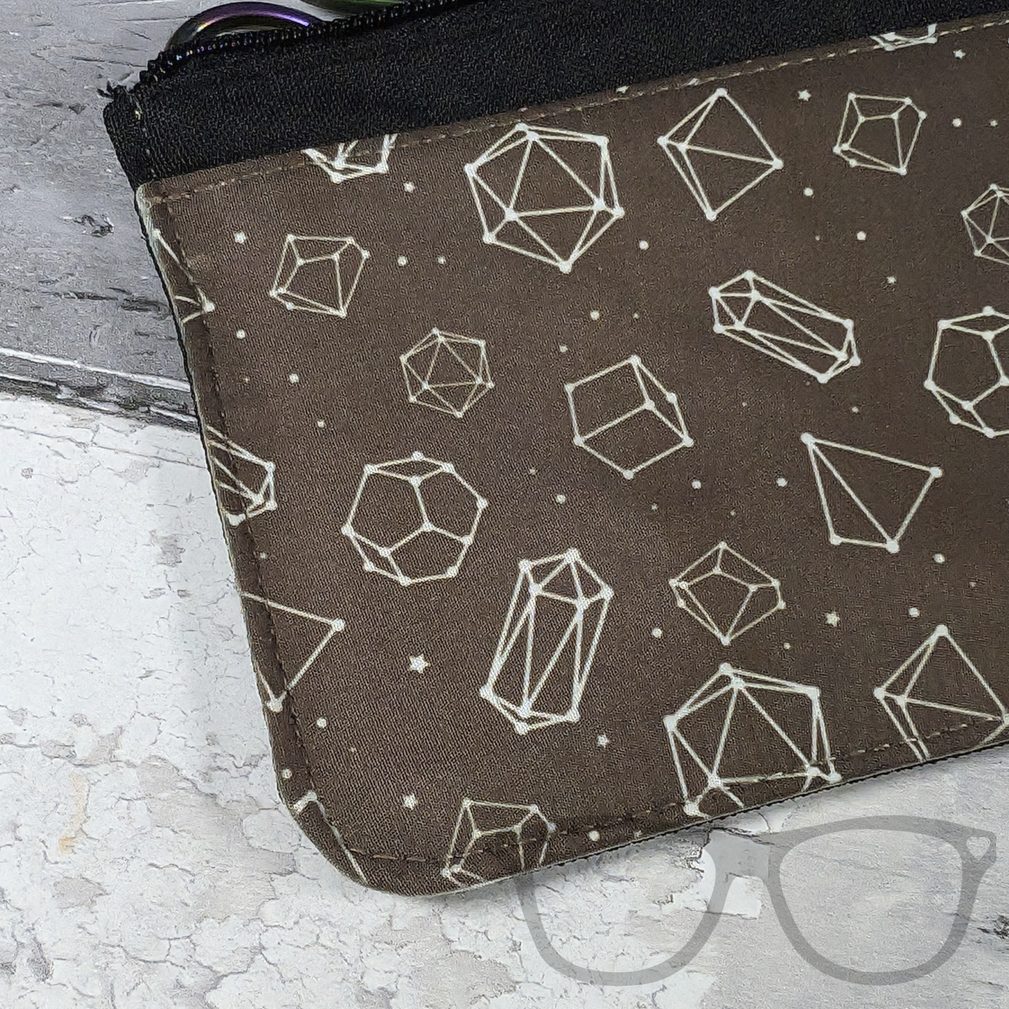 Close up of pattern of Black pencil case with white dice constellation pattern