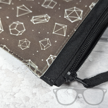 close up of zip detail Black pencil case with white dice constellation pattern