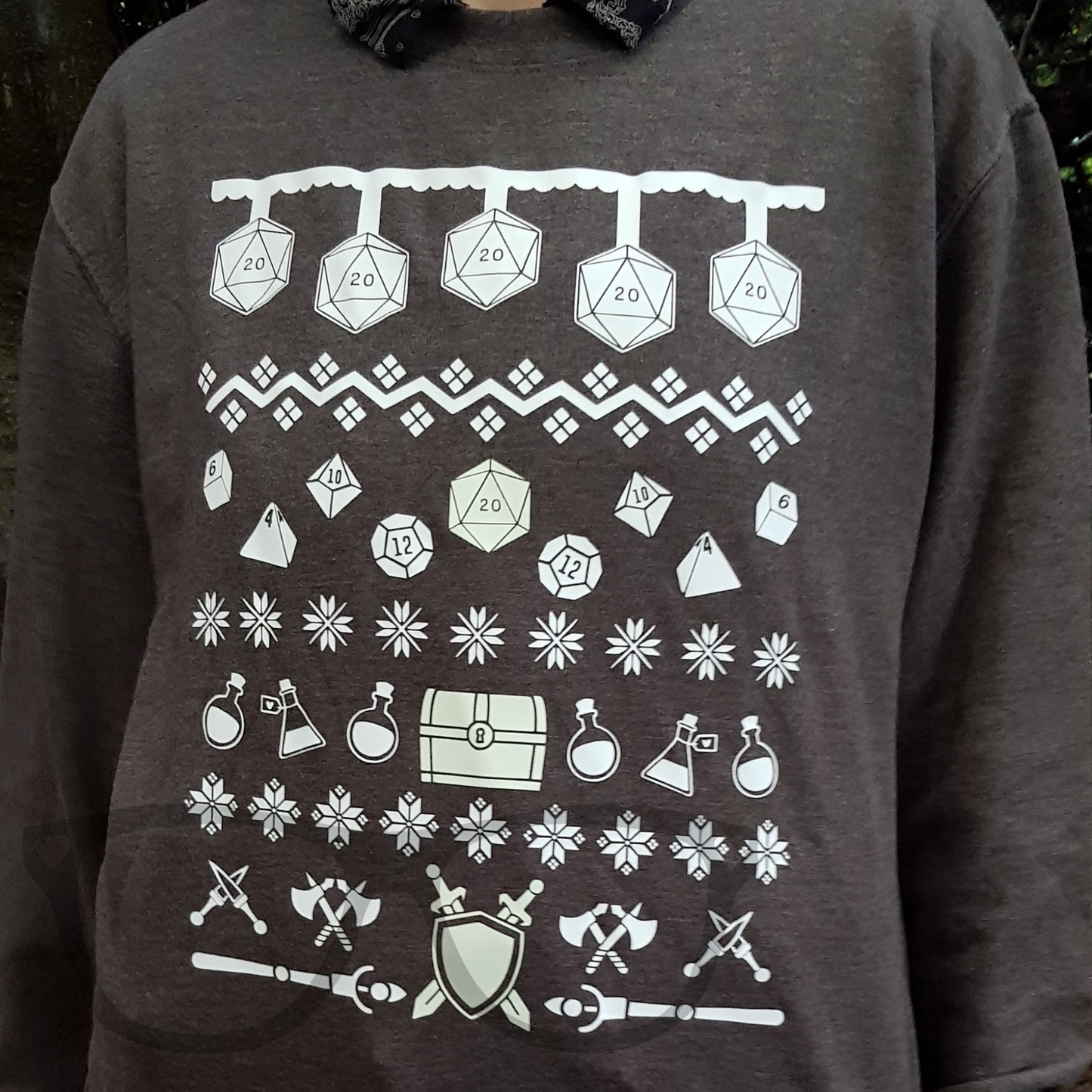 DnD themed Christmas Ugly sweater for kids and adults. Model is wearing a large but is a size medium