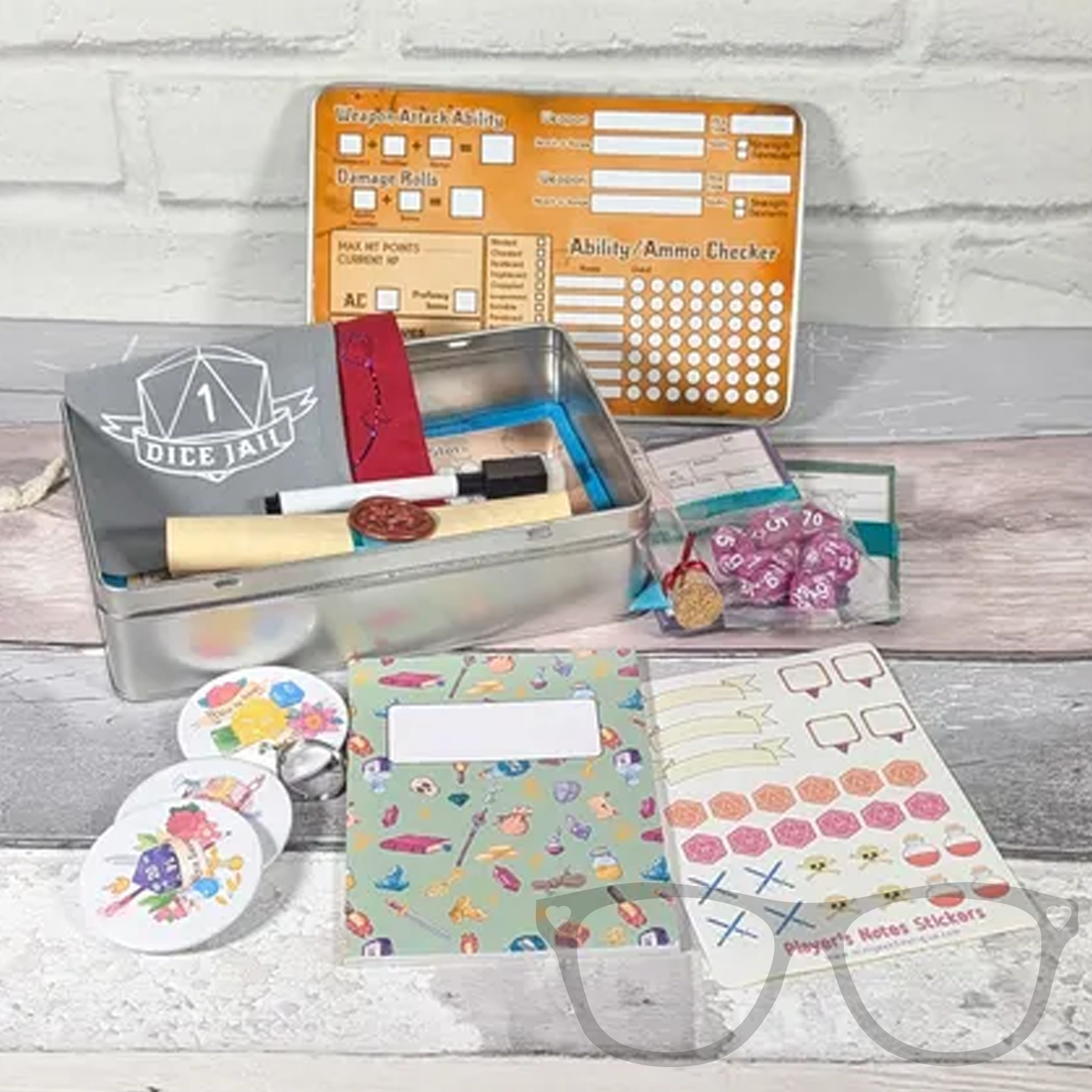 Dungeons and Dragons starter kit gift tin with dice, notebooks, stickers, and trackers for new and old tabletop gaming fans