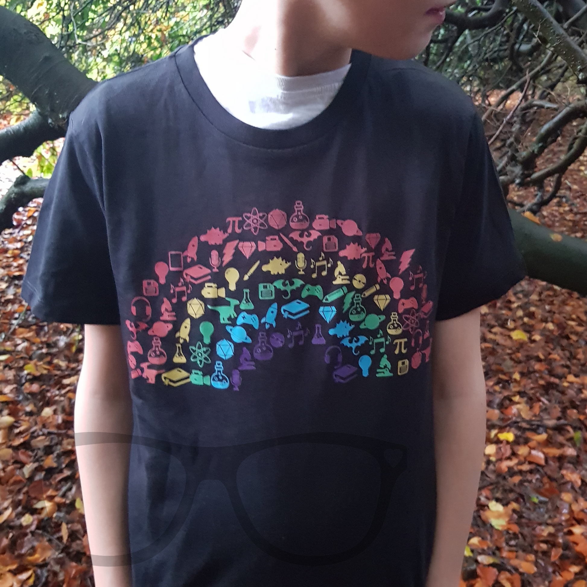 Geek and proud t-shirt. black t-shirt with a rainbow showing icons associated with being a geek. 