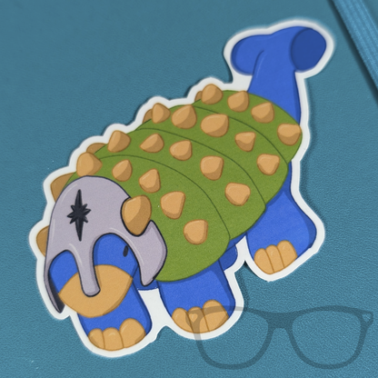 Hank the Tank Paladin Ankylosaurus vinyl sticker on a notebook