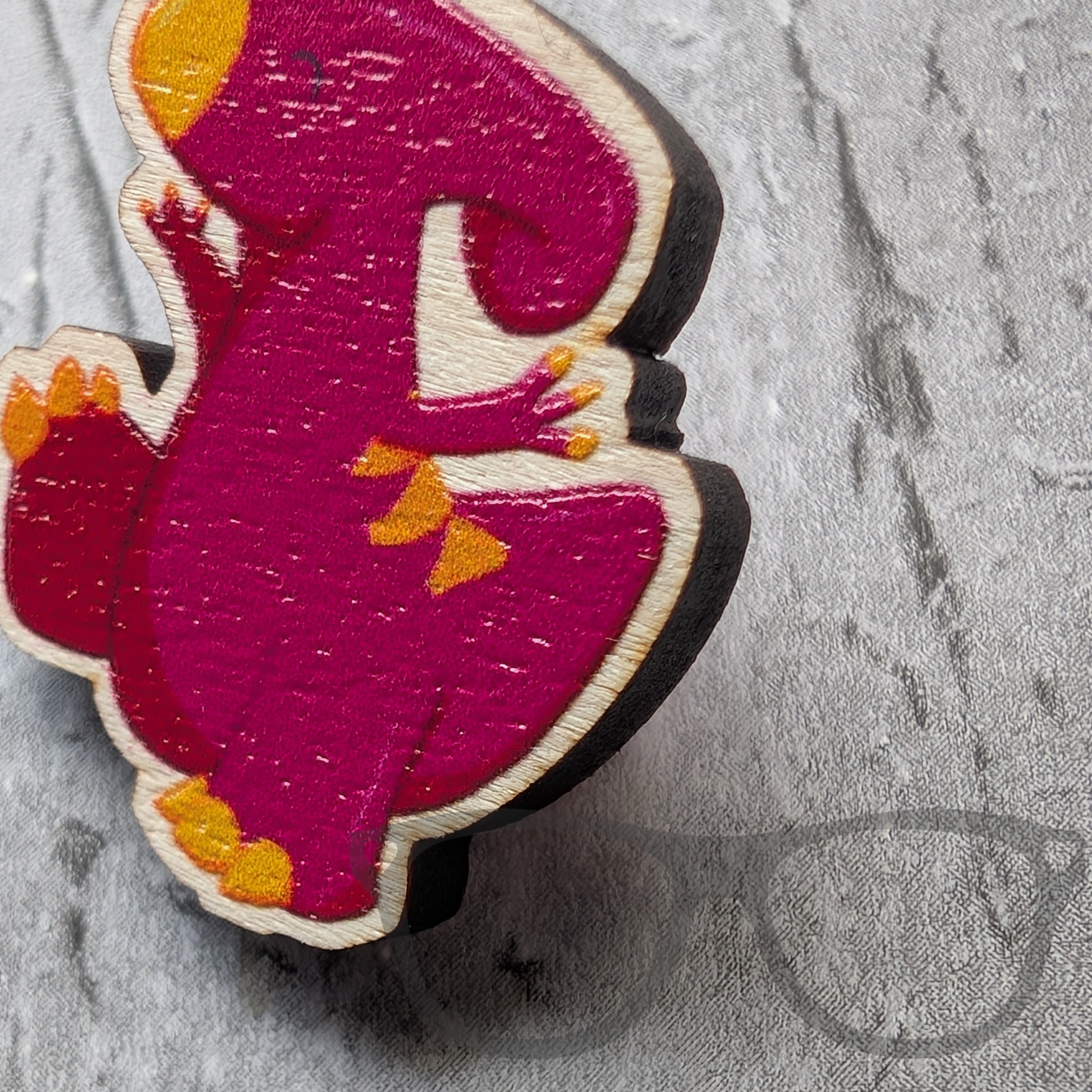 close up of the Irene the Parasaurolophus wooden pin