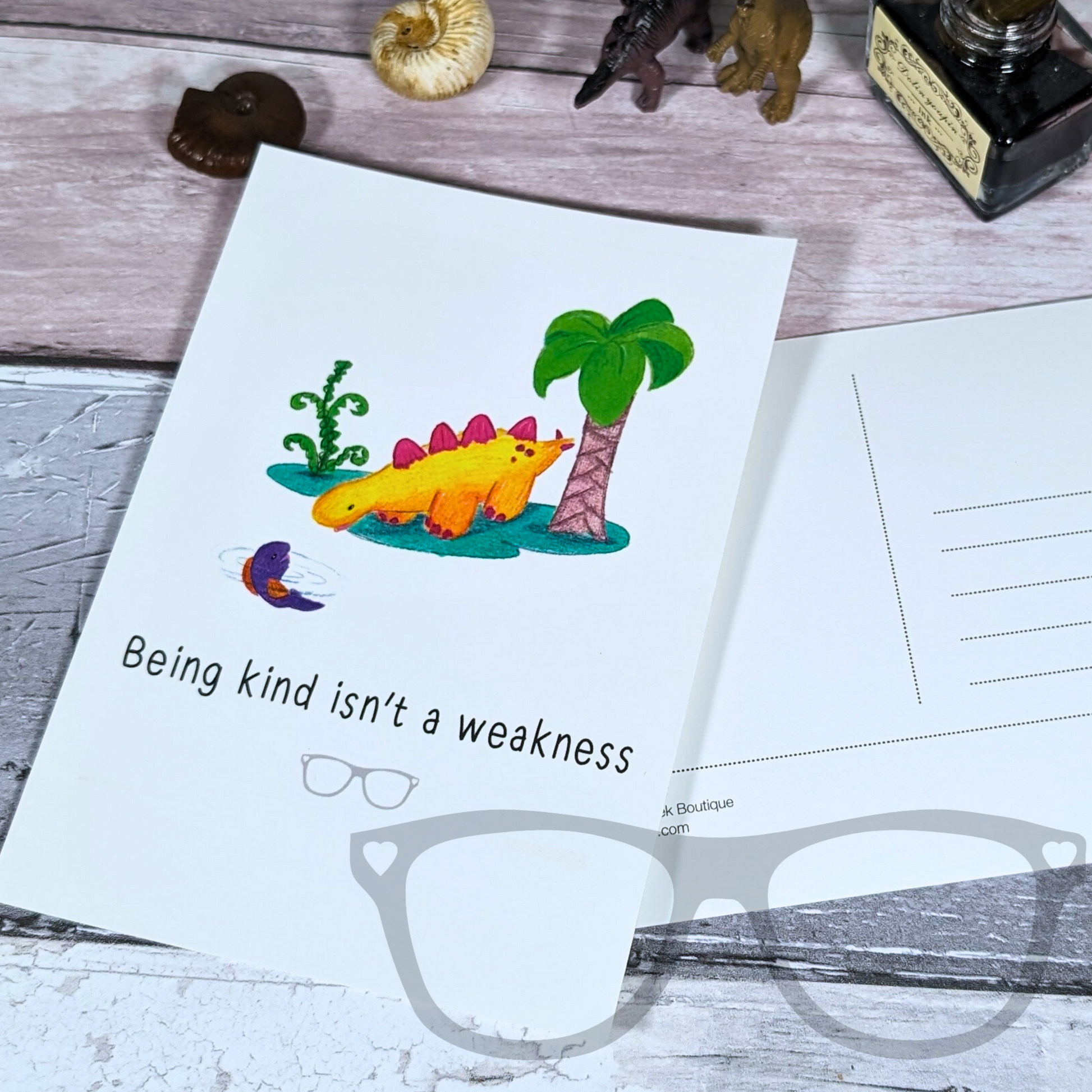 Back of Derek the Stegosaurus dinosaur kindness postcard, with space for a message and address. Designed with a matte finish for easy writing.