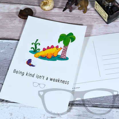 Back of Derek the Stegosaurus dinosaur kindness postcard, with space for a message and address. Designed with a matte finish for easy writing.
