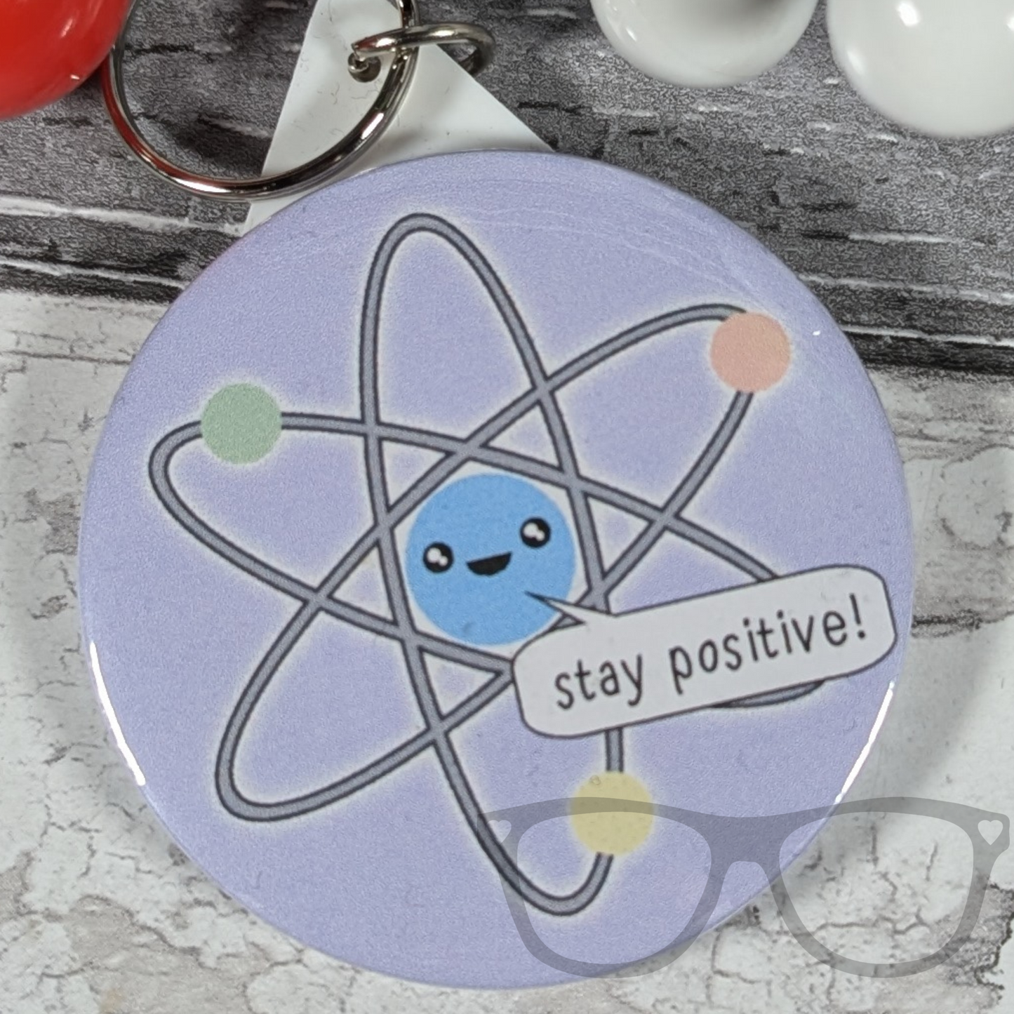 Stay positive atomic science keyring