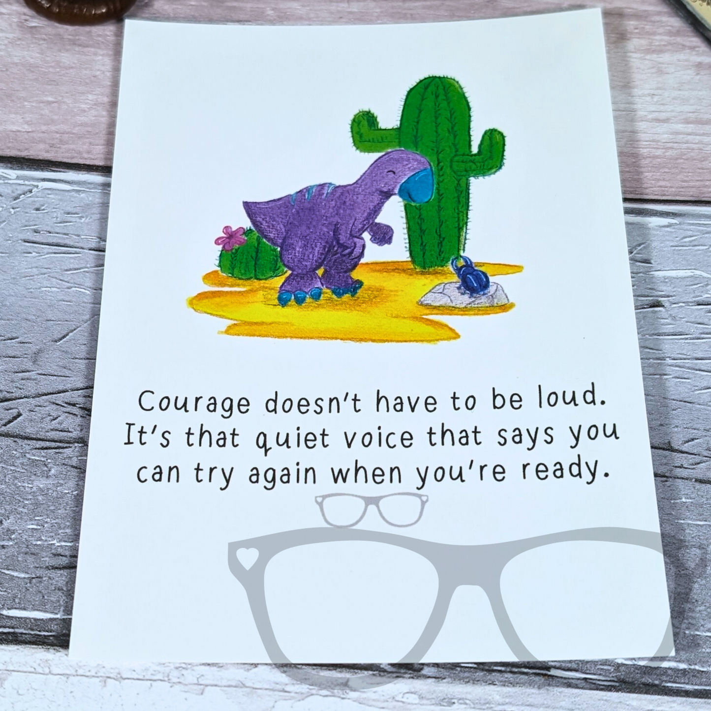 Courage doesn't have to be loud. It's the quiet voice that says you can try again when you are ready, dinosaur postcard