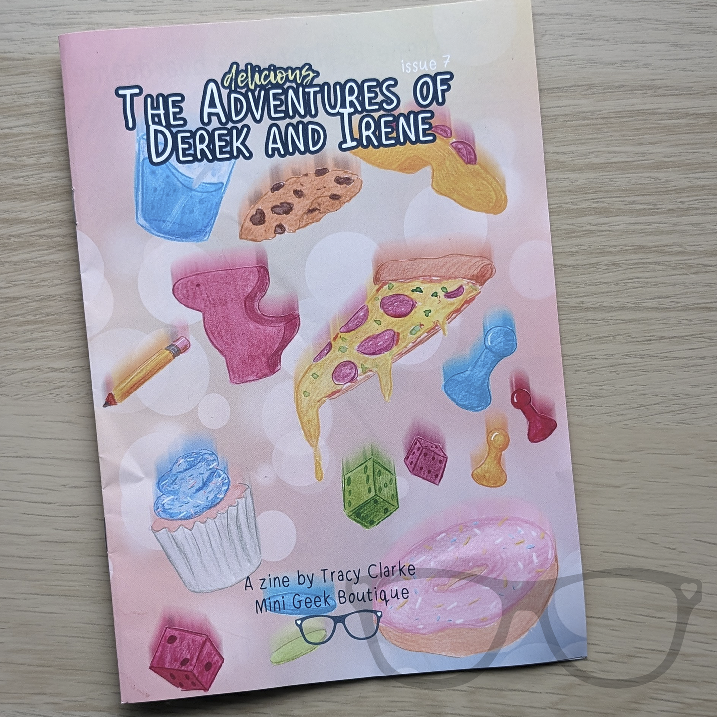 Adventures of Derek and Irene Issue 7 zine cover featuring colourful illustration of dinosaurs preparing for a board game night, with title and vibrant artwork.