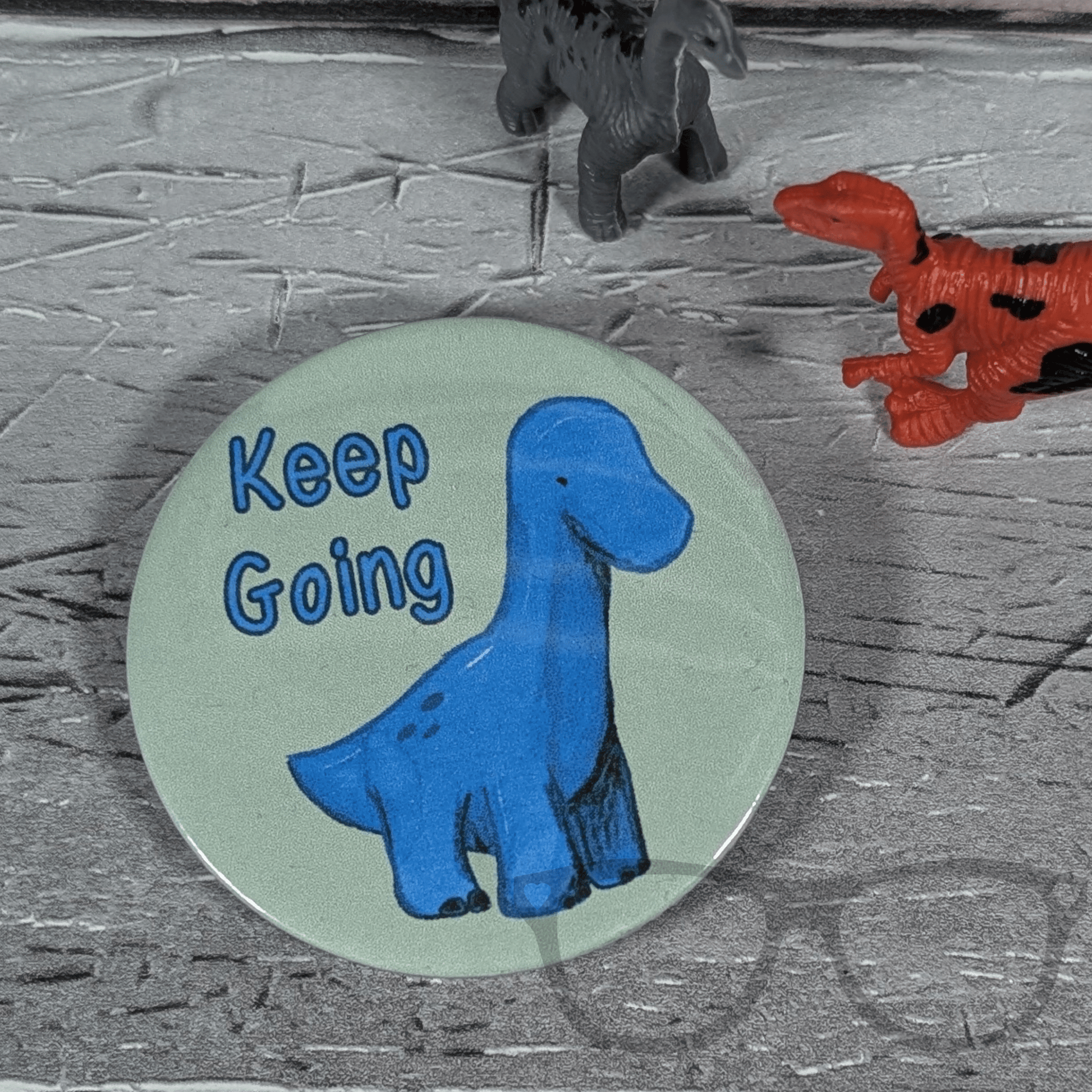 Brenda "Keep Going" 58mm Badge or Keyring – A Motivational Accessory - Mini Geek Boutique