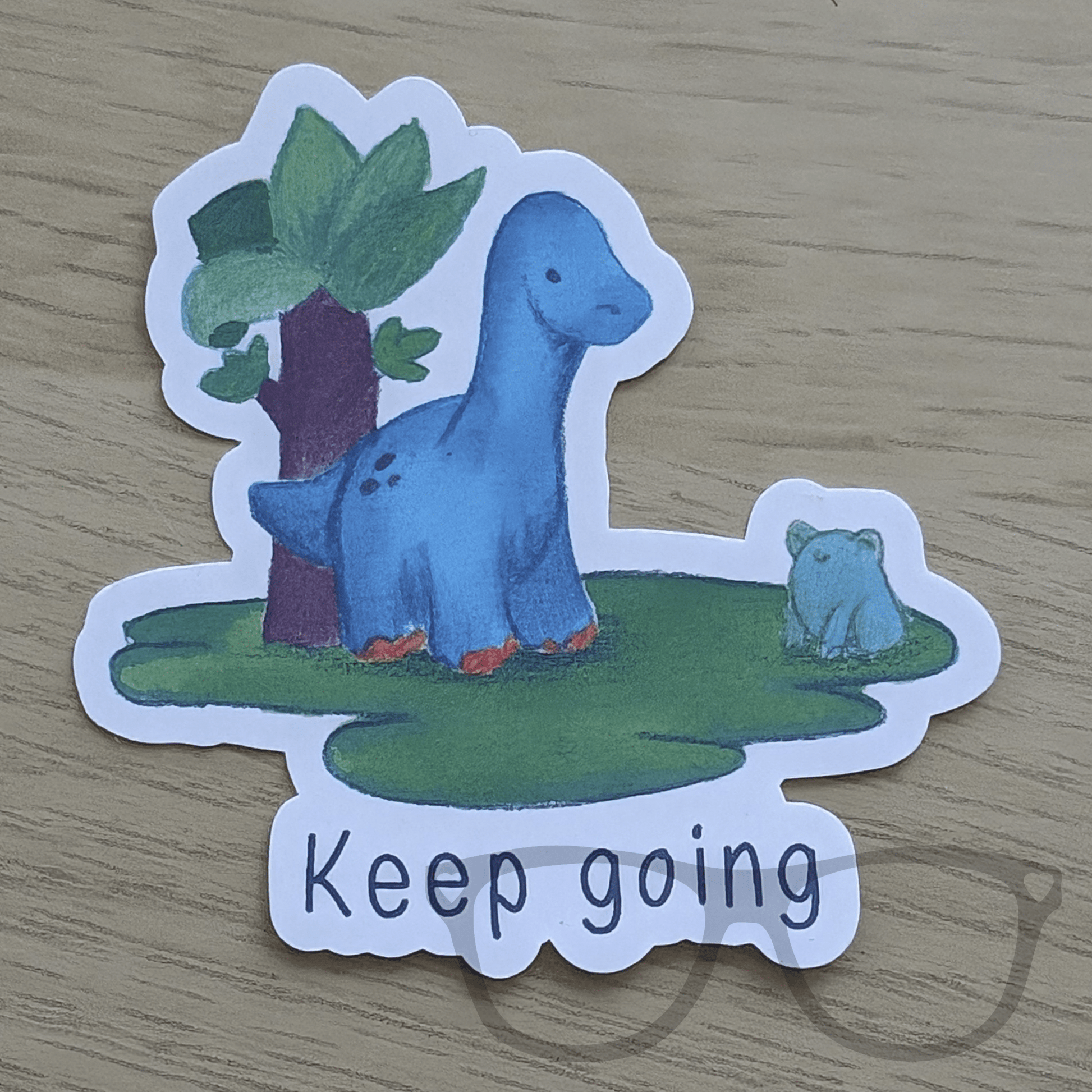 Positive dinosaur vinyl sticker for kids featuring Brenda the brachiosaurus with "Keep Going" design, Mini Geek Boutique
