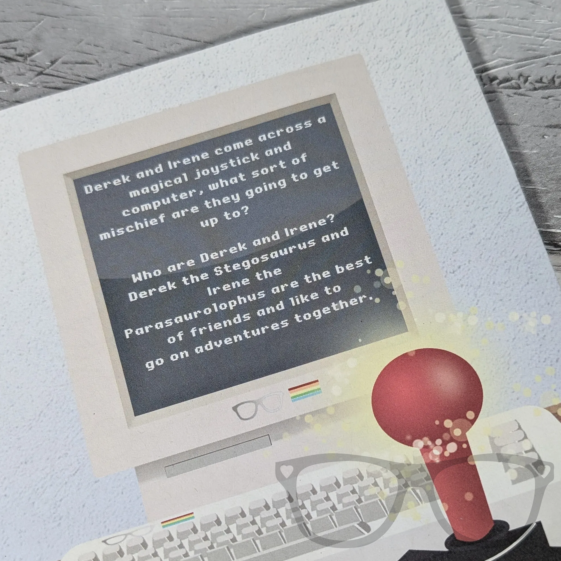 Close-up of the back cover of The Adventures of Derek and Irene Issue 8 zine, featuring fun, vibrant artwork and information about the content inside