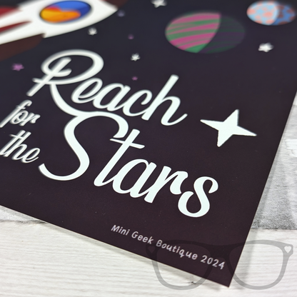 Close up of Reach for the stars art print, showing the white text reads "Reach for the stars"