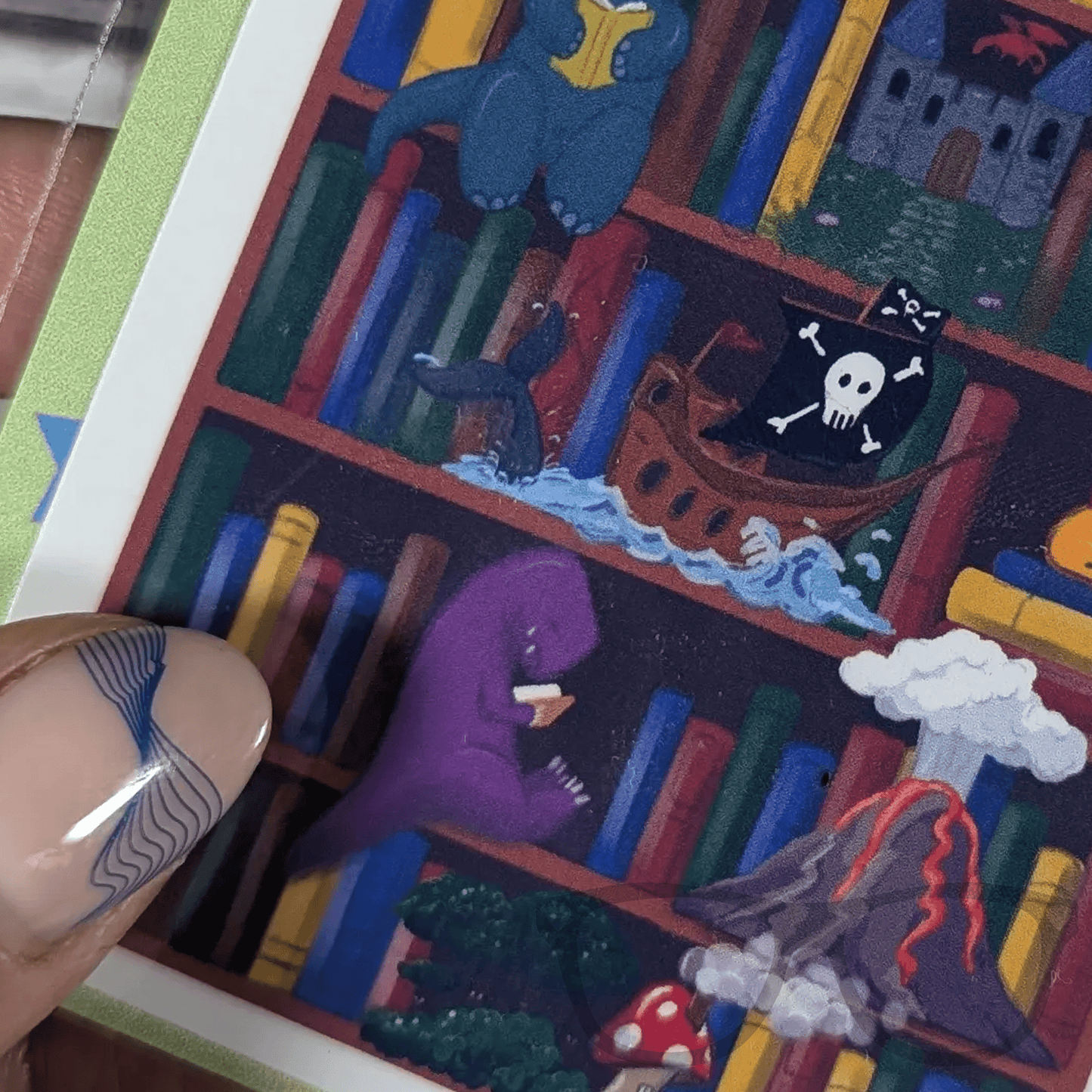 Dinosaur Reading Vinyl Sticker – Magical Adventure for Book Lovers - Mini Geek Boutique