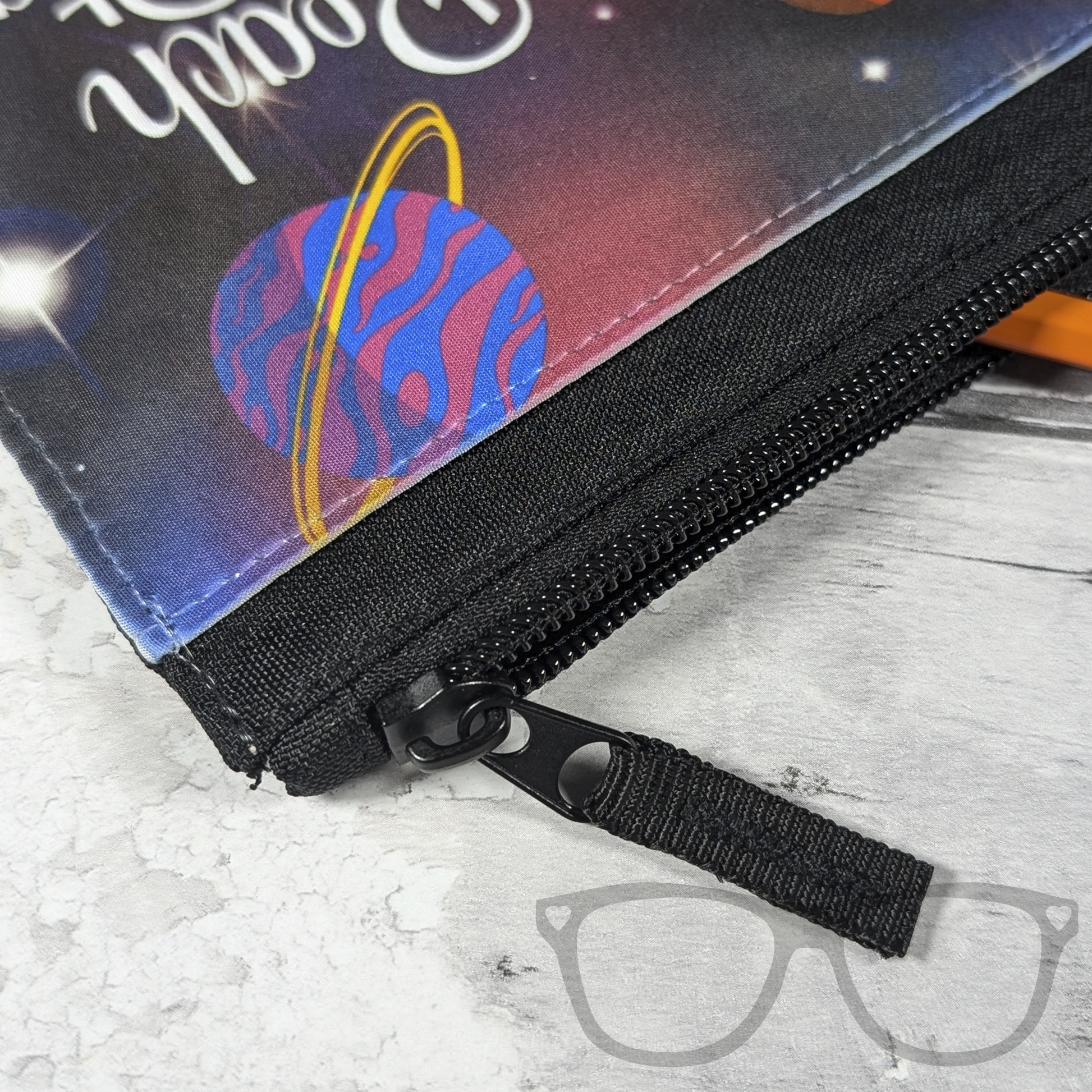Dinosaur in space reach for the stars pencil case zip detail