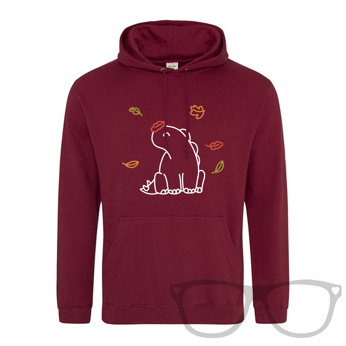 Mock up showing Burgundy Hoodie with kangaroo pocket for Autumn featuring Derek the Stegosaurus sitting amongst the falling autumn leaves