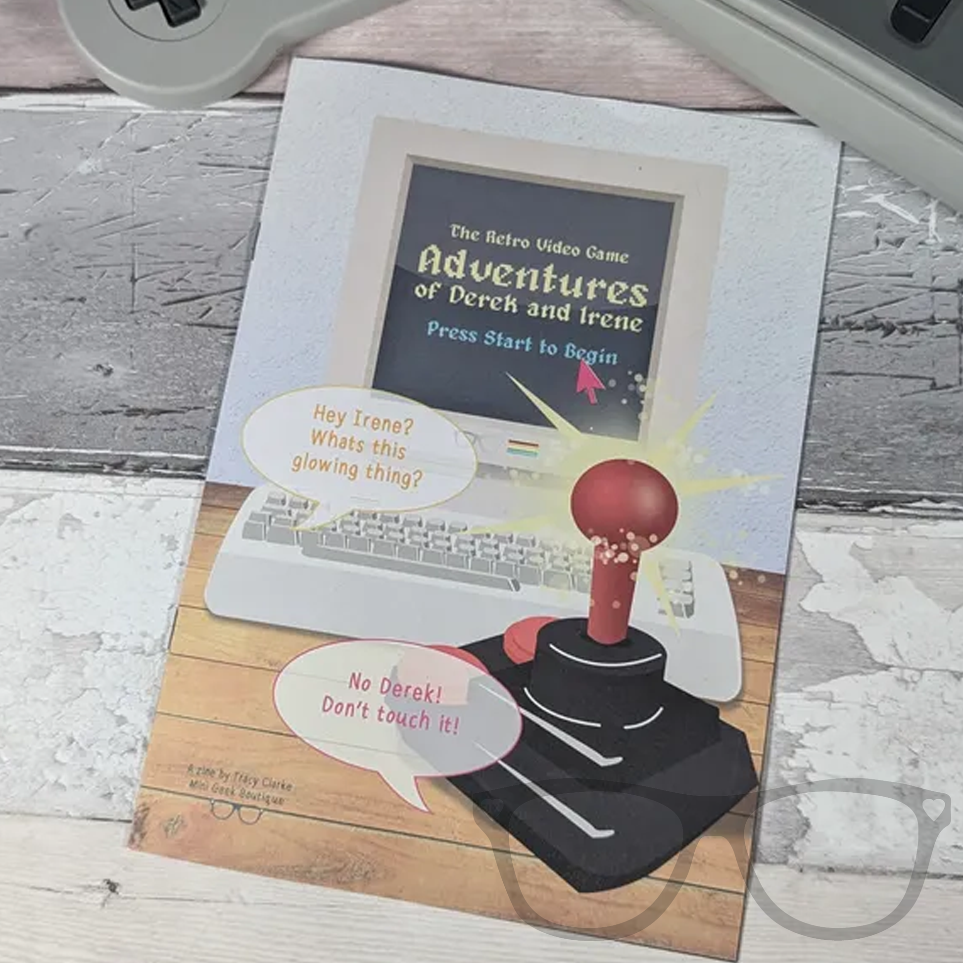 Front cover of Issue 8 of The Adventures of Derek and Irene zine, featuring a retro video game-themed illustration with Derek and Irene in pixelated form