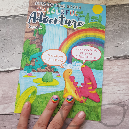 Issue 5 Derek & Irene How Rainbows Are Made Zine Cover with Colourful Dinosaurs