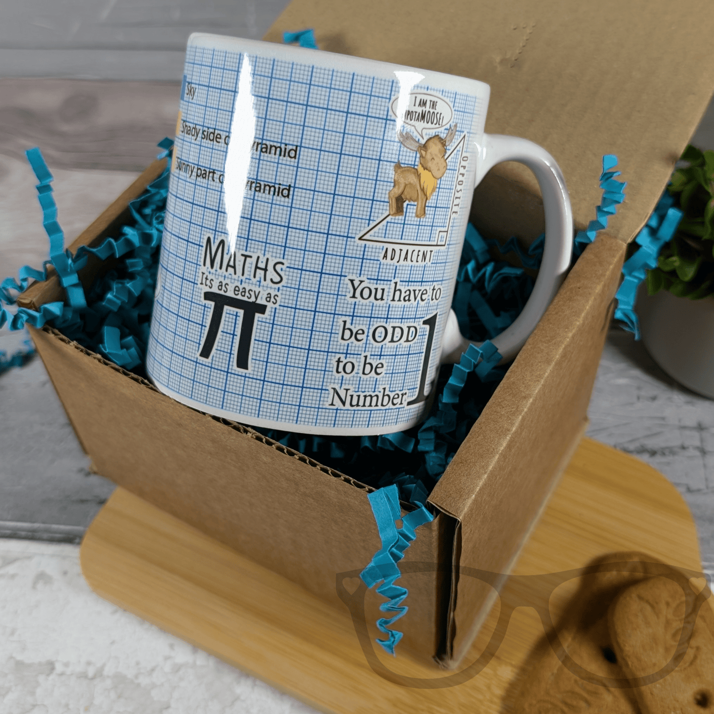 Mug with mathematical design in a box with blue tissue paper