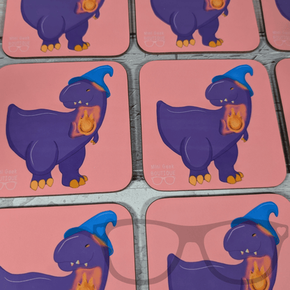 DnD-inspired drink coaster showing Mr Bolan the purple T. Rex as a wizard with blue hat and flame, Mini Geek Boutique