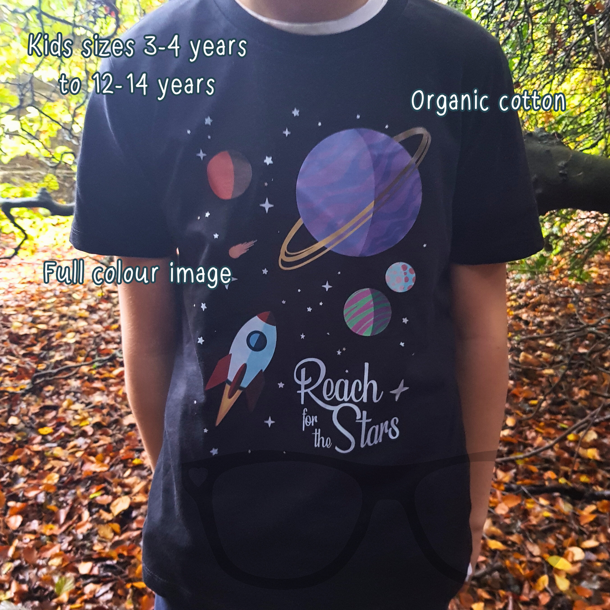 Reach for the stars space themed full colour design featuring a rocket in space on a black organic cotton t-shirt. text reads "Kids Sizes 3-4 years to 12-14 years", "organic cotton" and "Full colour image"