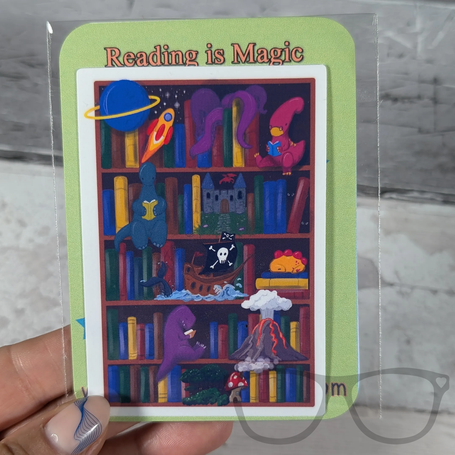 Dinosaurs reading vinyl sticker in eco-friendly packaging
