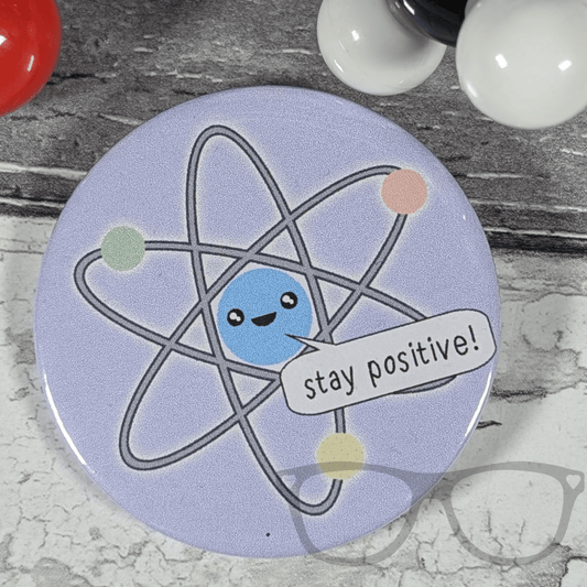 Stay Positive Atom 58mm badge - Mini Geek Boutique