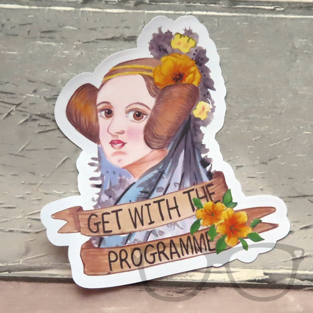 Ada Lovelace sticker a die cut sticker showing Ada Lovelace surrounded by a banner that says "Get with the Programme".