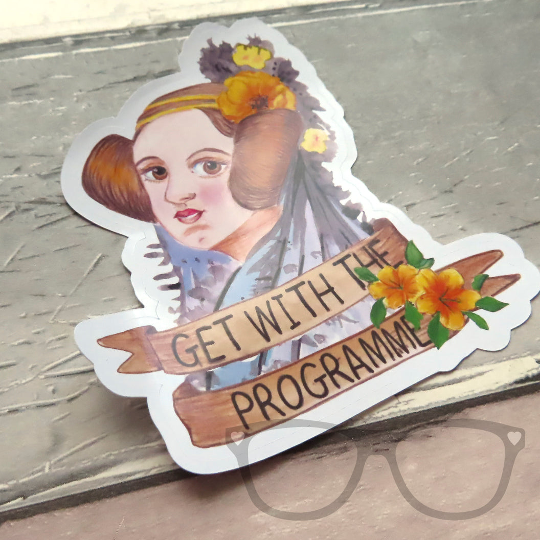 A vinyl sticker showing a portrait of Ada Lovelace the first computer programmer, the text reads "Get with the programme"