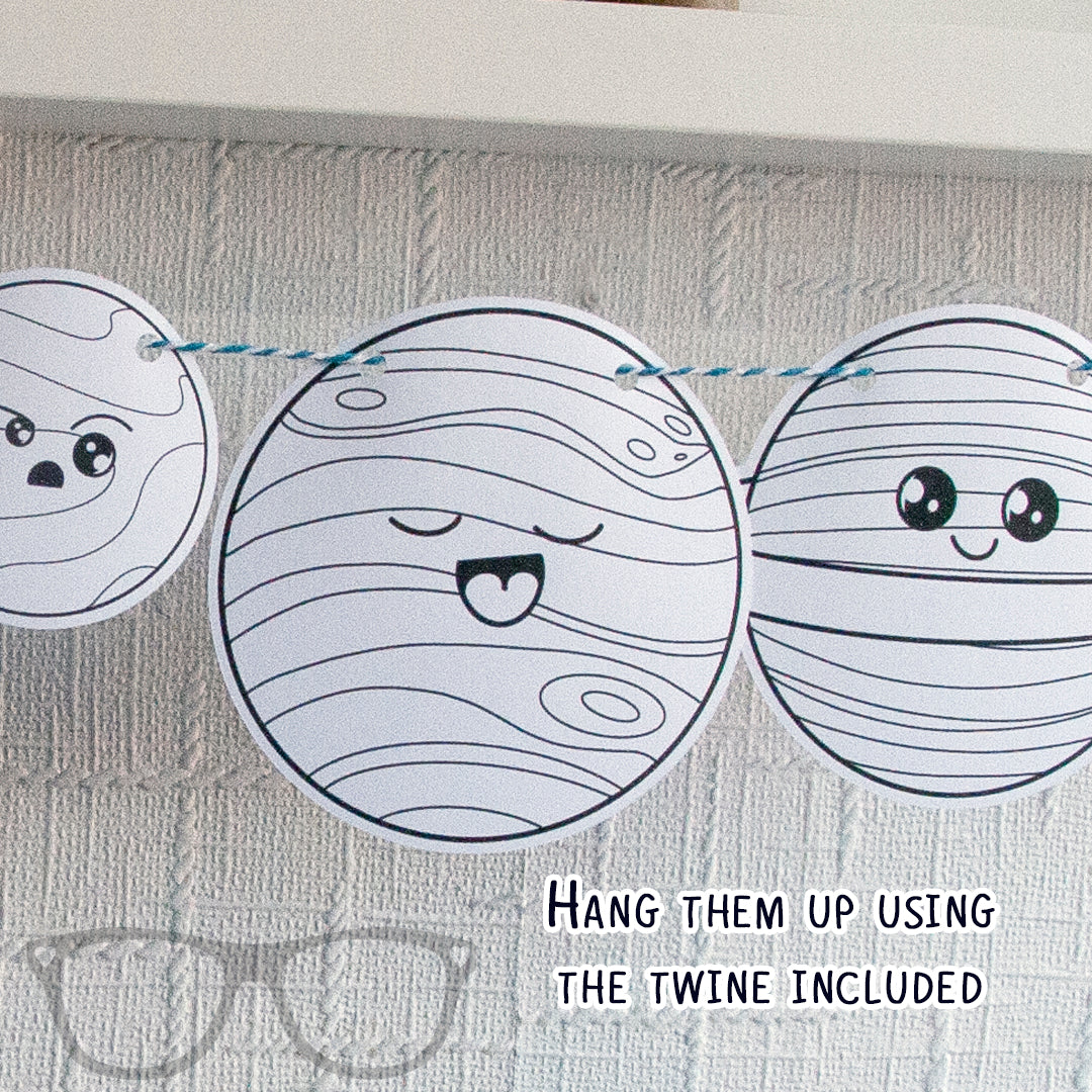 Mars, Jupiter, and Saturn illustrations with the text 'Hang them up using the twine included' – great for creating your own solar system display.
