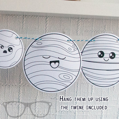 Mars, Jupiter, and Saturn illustrations with the text 'Hang them up using the twine included' – great for creating your own solar system display.