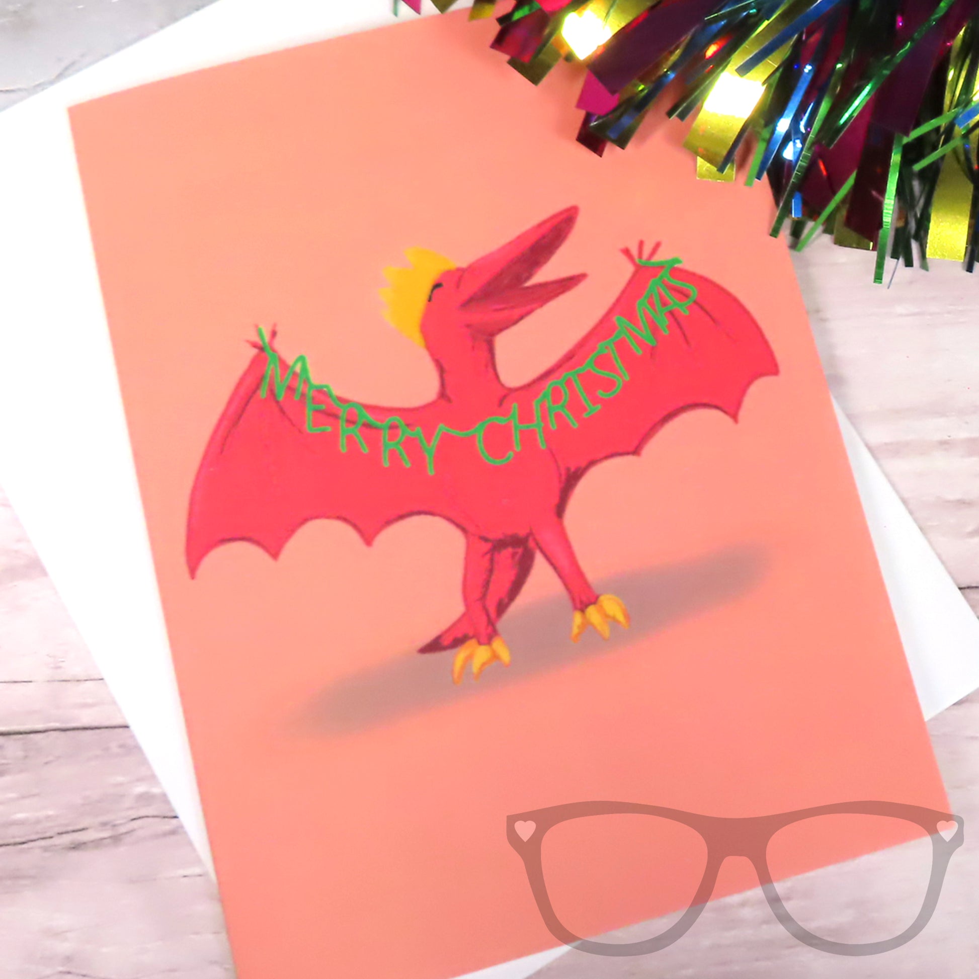 Close up of the Design of the Christmas card ideal for dinosaur fans