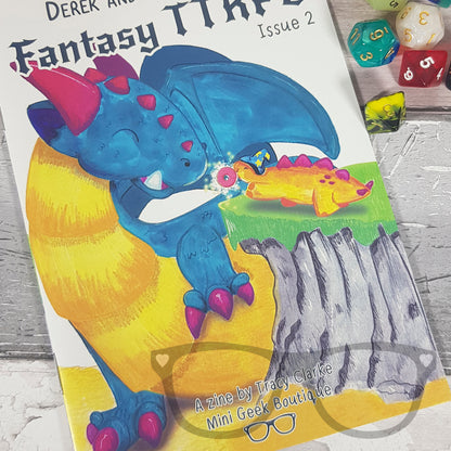 Close-up view of the front cover of Adventures of Derek and Irene Issue 2 zine, featuring vibrant artwork of Derek and Irene in a fantasy tabletop game setting.