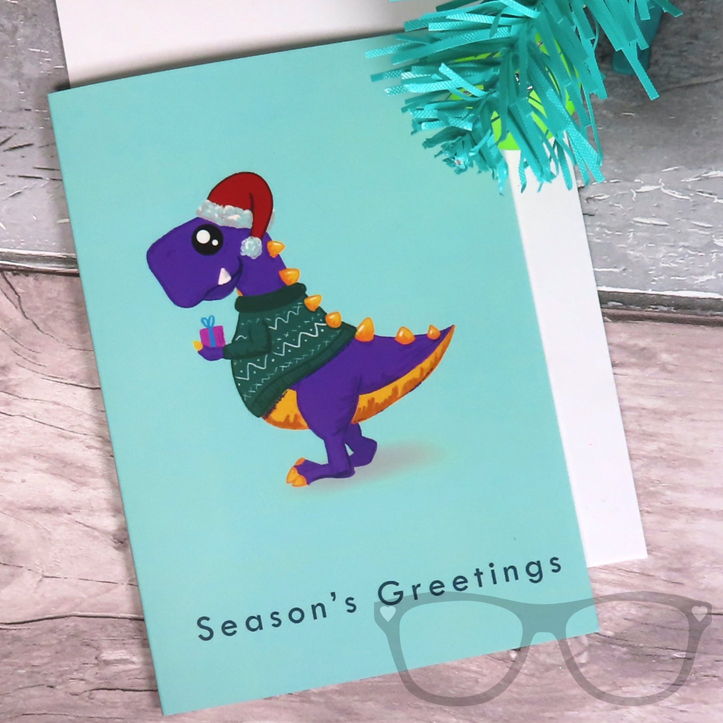 Christmas Card featuring a dinosaur