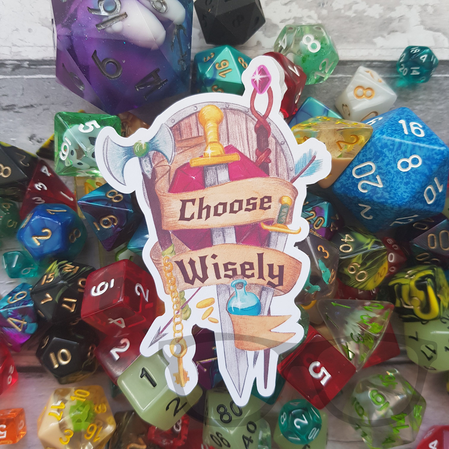 Choose wisely sticker. A watercolour illustration showing a range items used in tabletop RPGs with text that reads "Choose wisely" a big pile of dice is shown in the background.