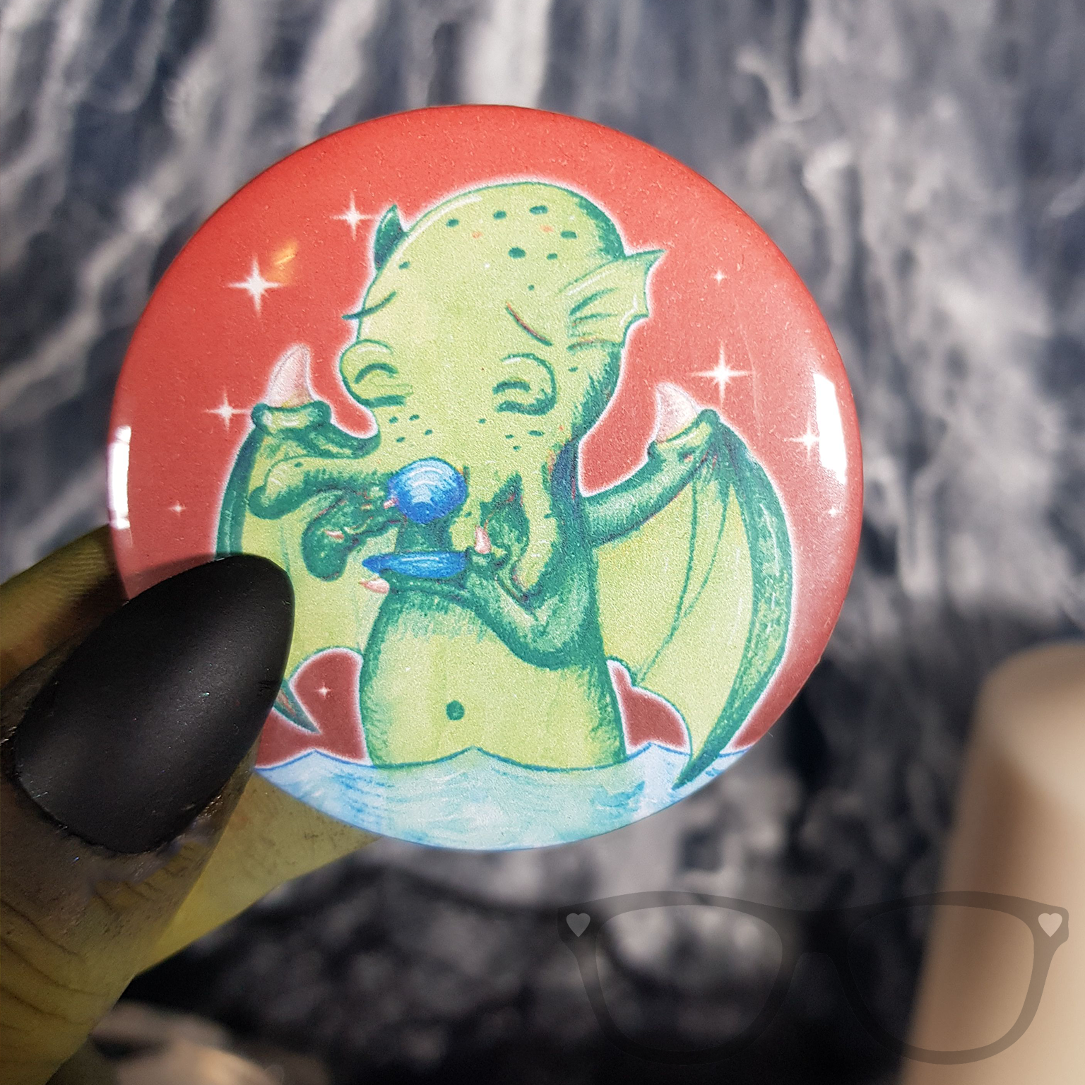 58mm circular badge showing Cthulhu drinking tea