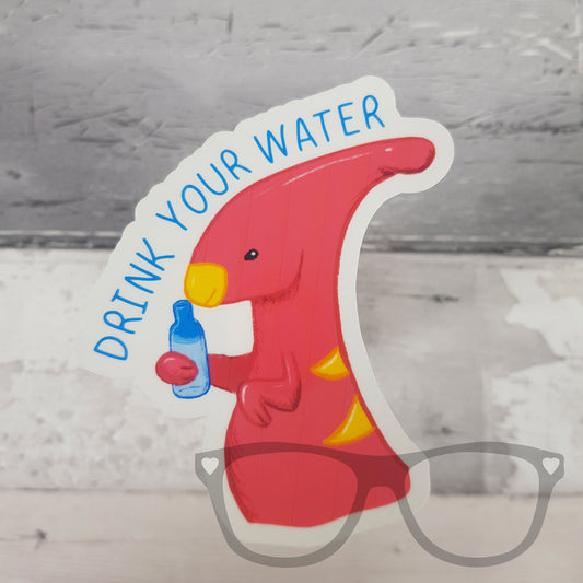 Drink Your Water vinyl sticker featuring Irene the Dinosaur, encouraging hydration and healthy habits, perfect for decorating laptops, water bottles, and notebooks.