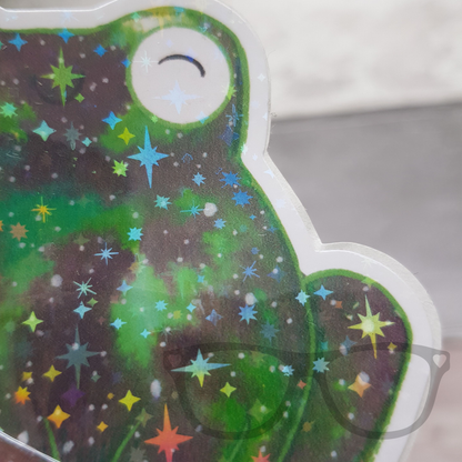 Green frog sticker close up to show star sparkle